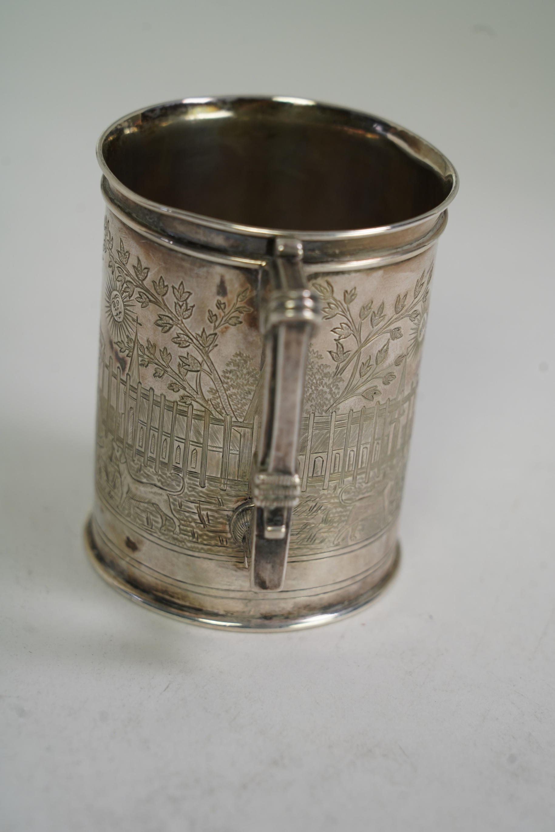 A 19th century Indian colonial white metal christening mug, by P. Orr & Sons, Madras